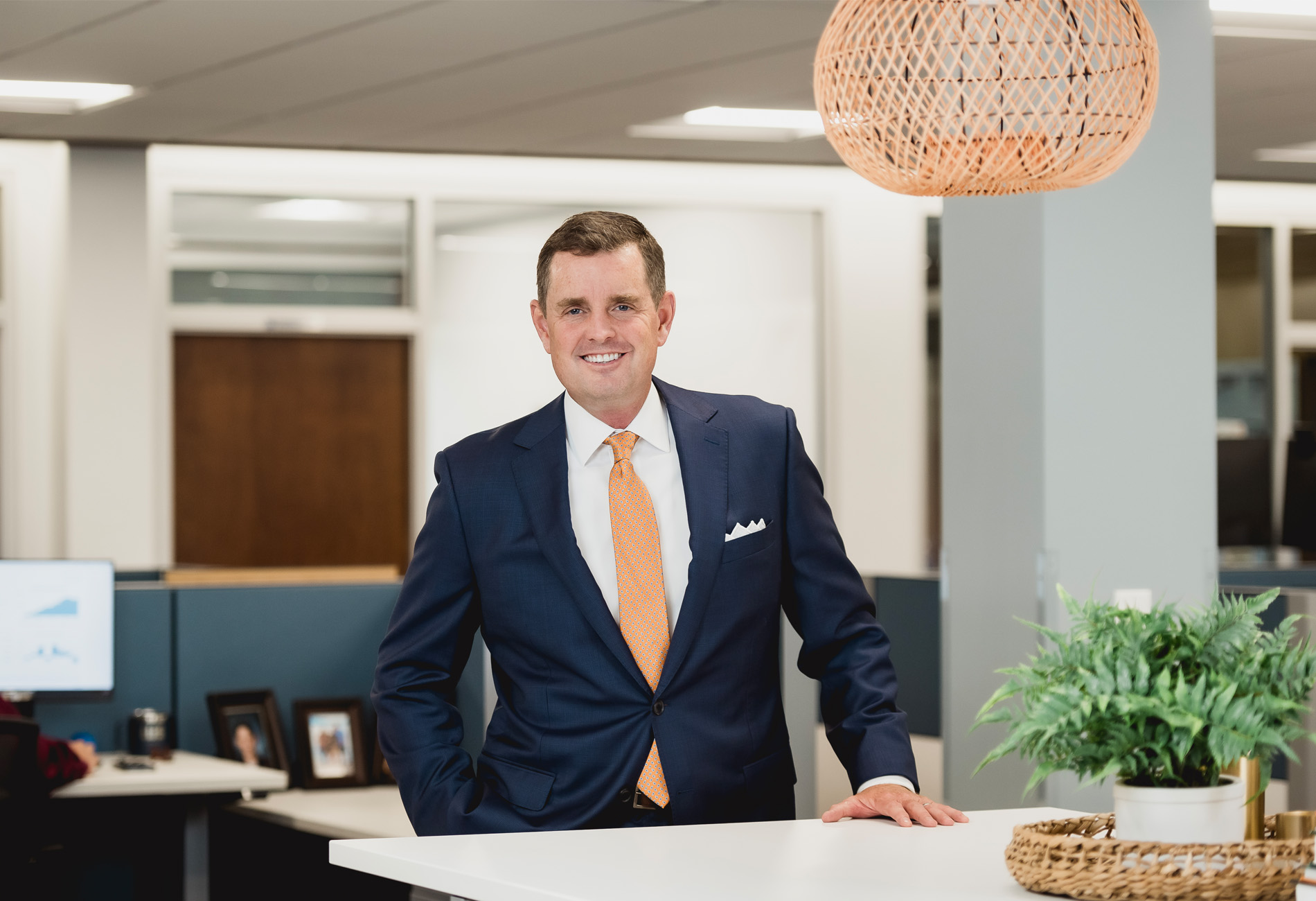 Alan Leist III CFA, CEO, Financial Advisor: A man with short brown hair wearing a blue sport coat and tie. Strategic Financial Services Leadership Team.